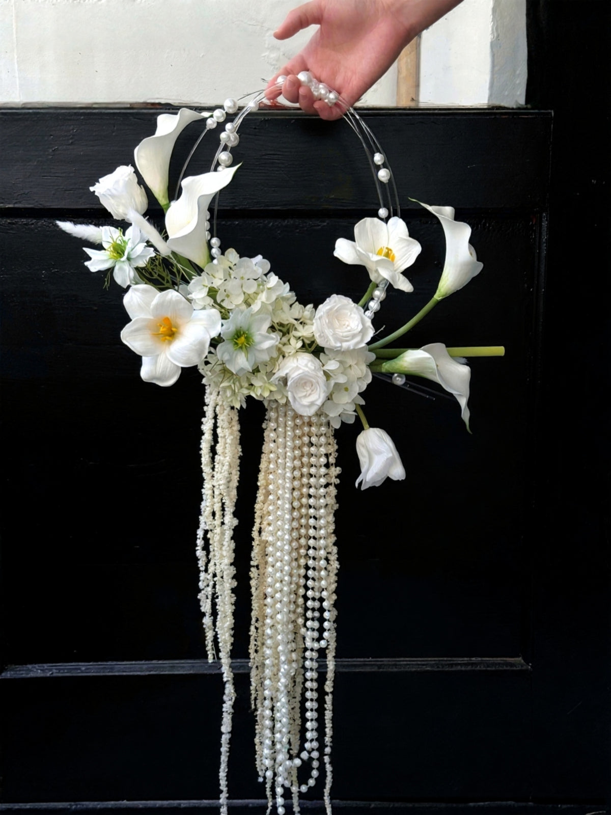 white pearl artificial bridal bouquet with soft white flowers for wedding ceremony photos